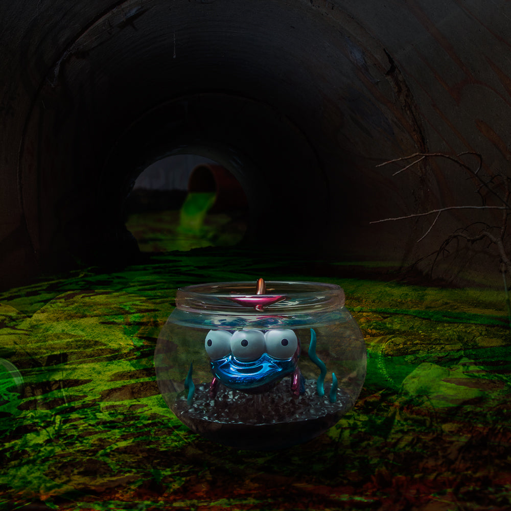 The Simpsons - Blinky in Fish Bowl 5.5” Vinyl Art Figure (Nuclear Electroplate Edition) - NYCC 2025 Debut - SOLD OUT!